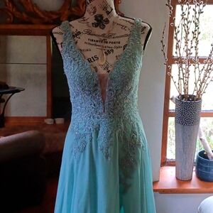 Long formal dress in aqua blue